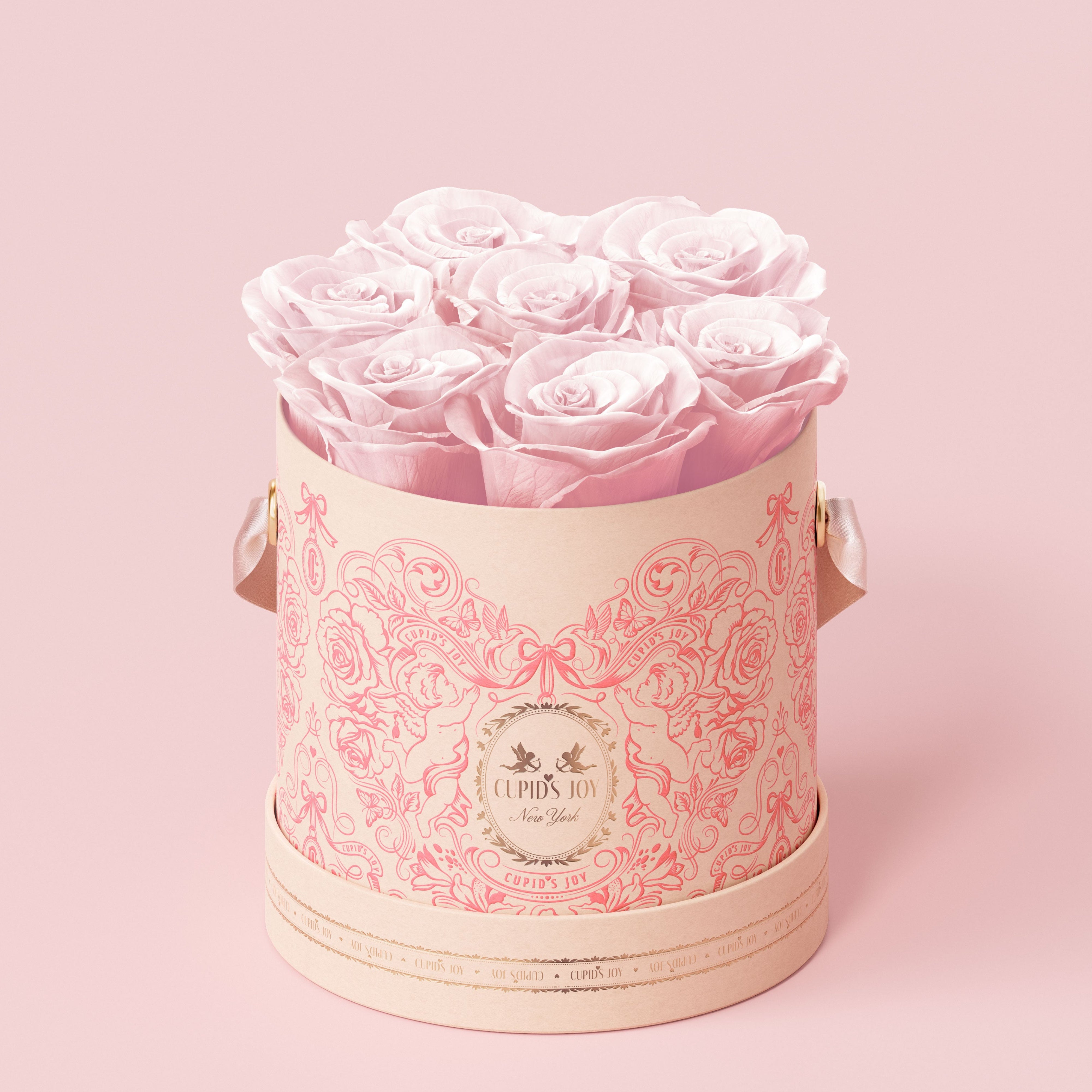 Heart-motif box with pink eternal roses on a pink background