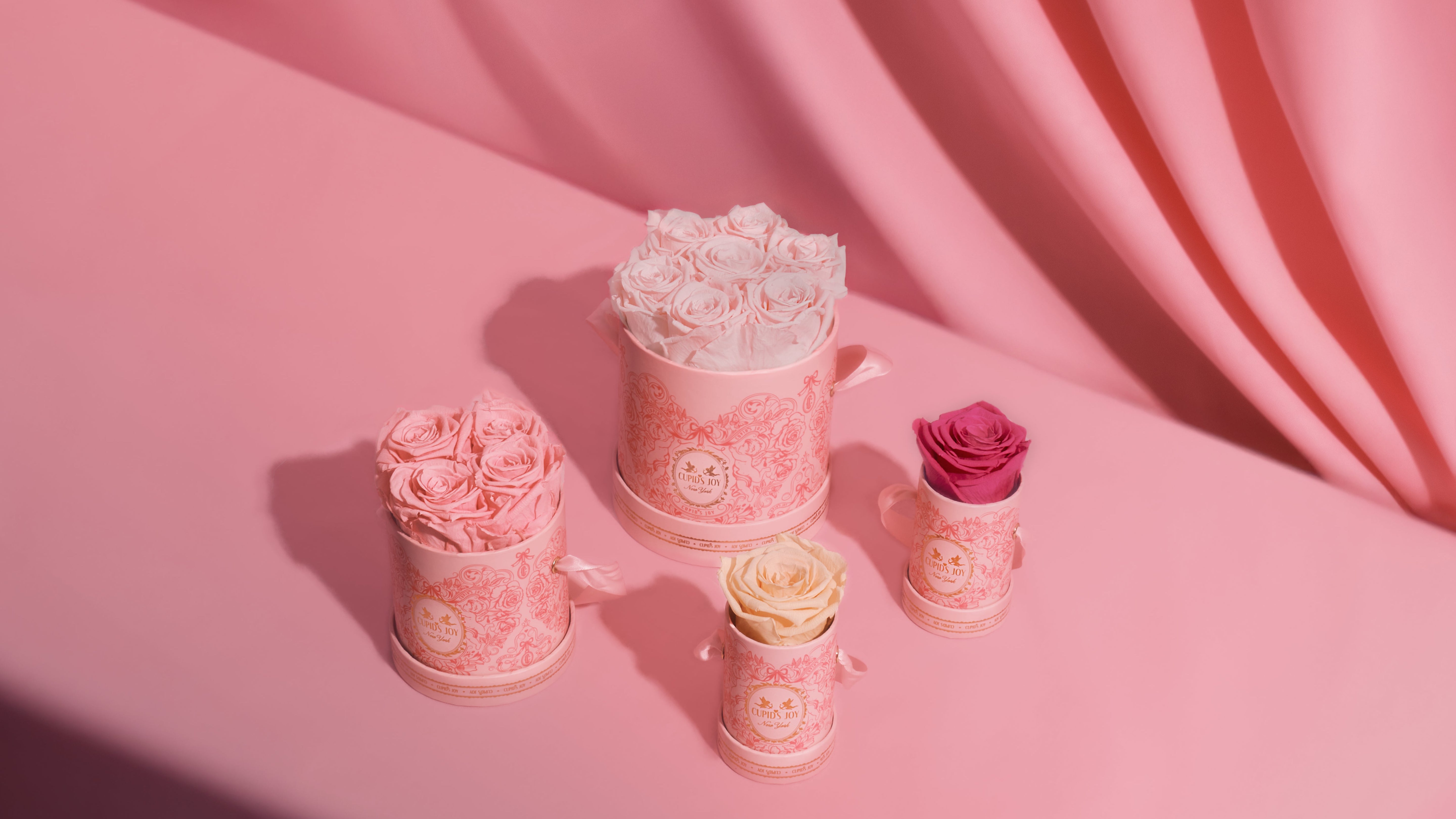 Cupid's Joy preserved rose collection in luxury pink boxes by Maison Cupid